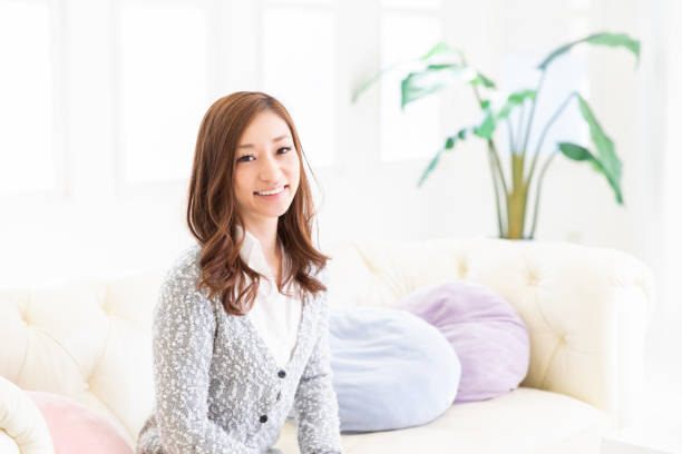 istock asian woman relaxing 1204313482