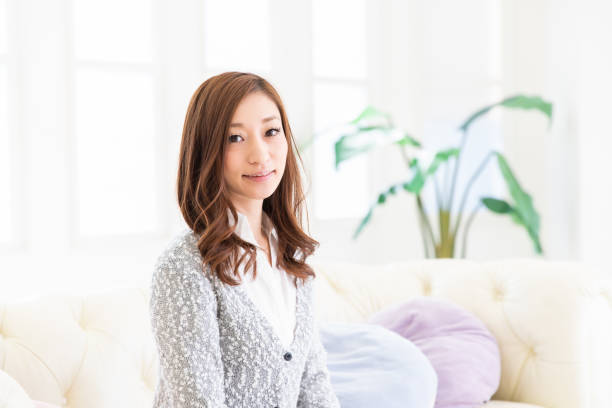 istock asian woman relaxing 1204313530
