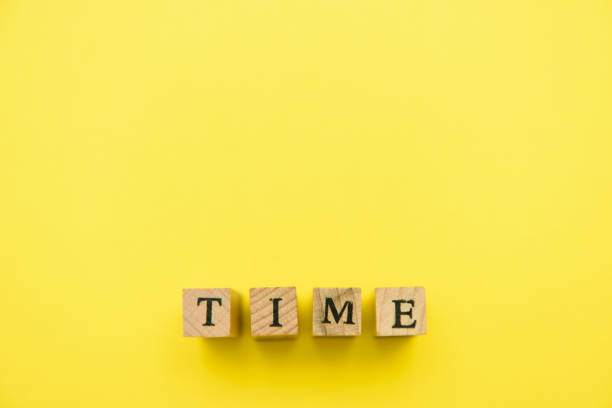 istock alphabet numeral stamp yellow 1204319055