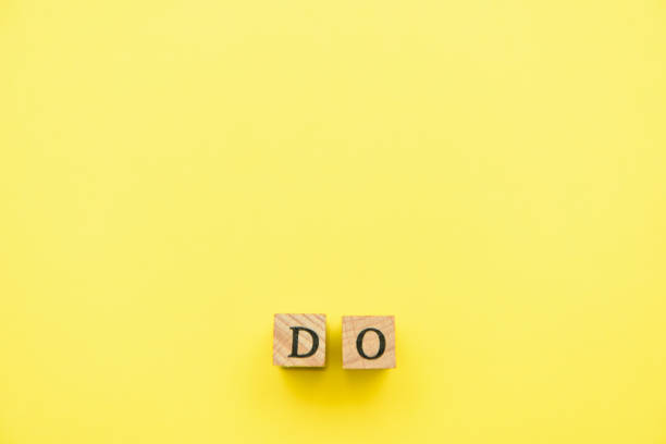 istock alphabet numeral stamp yellow 1204319067