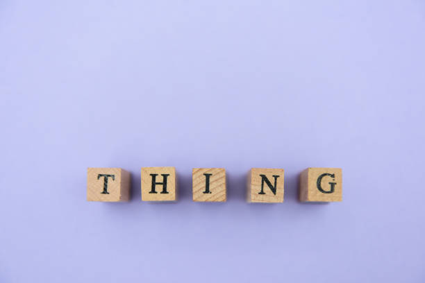 istock alphabet numeral stamp purple 1204320037