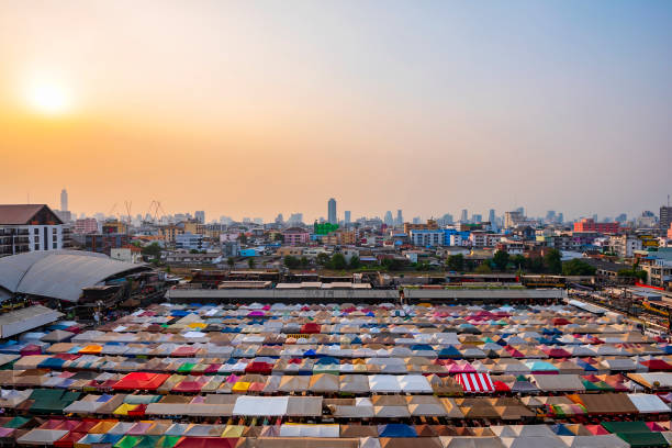 istock Sunset at Train Night Market Ratchada in Bangkok, Thailand. 1204326197