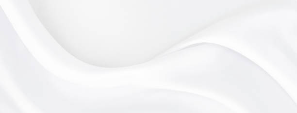 istock White gray satin texture that is white silver fabric silk panoramic background with beautiful soft blur pattern natural. 1204327039