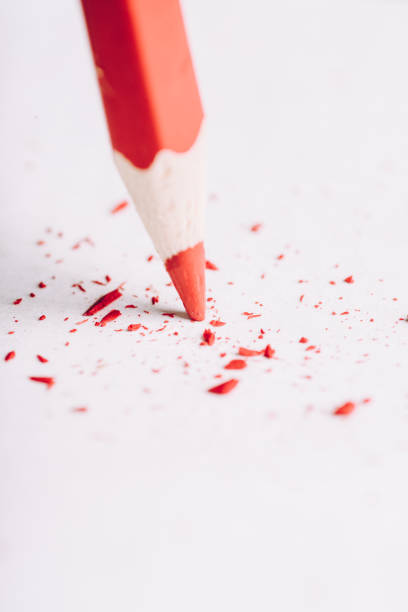 istock Pencil with sharpening shavings on the rustic background 1204334433