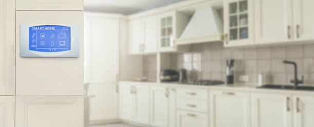 istock Smart home technology concept banner. Touch screen display of modern house control unit. Great design for wireless home automation systems concept. 1204335172