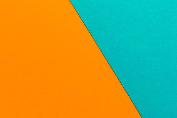 istock Trending colors in 2020. Abstract deep orange and blue background. Abstract geometric background for design. 1204335420