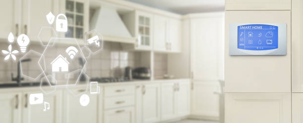 istock Smart home technology concept banner. Touch screen display of modern house control unit. Great design for wireless home automation systems concept. 1204335430