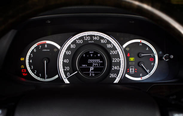 Car speedometer with kilometer per hour. Car speedometer with kilometer per hour and tachometer,fuel meter,odometer and warning light on a car dashboard. car odometer stock pictures, royalty-free photos & images