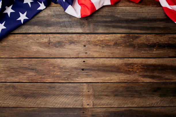 istock USA flag on an empty old wooden background 1204341485
