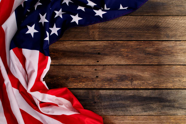 istock USA flag on an empty old wooden background 1204341495