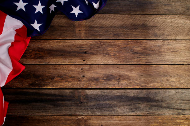 istock USA flag on an empty old wooden background 1204341533