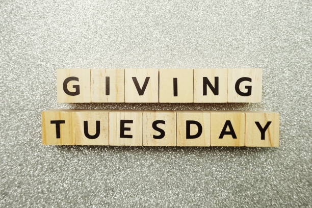 istock Giving Tuesday alphabet letter on silver glitter background 1204342451