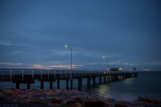 istock Mandorah jetty at night Darwin, Northern Territory, Australia, Top End. 1204343601