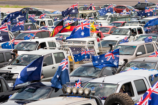 Australia Day UTE run Darwin, Northern Territory, Australia. UTE or pickup truck with Australian flags