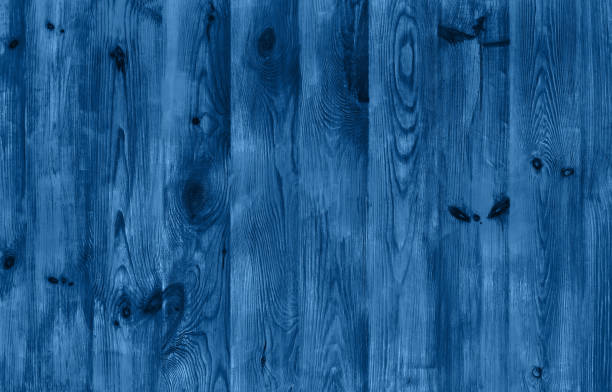 istock old wooden plank background with knots 1204348509