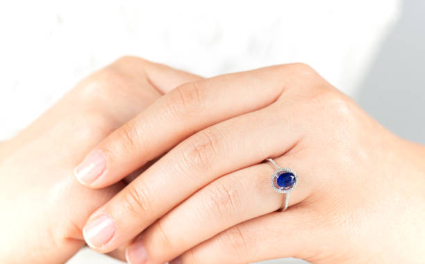 istock Woman Hands With Sapphire Engagement Ring 1204348568