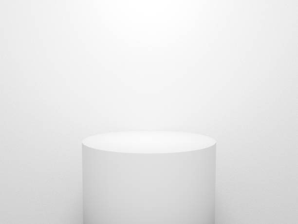 istock 3d exhibition stand. white blank empty podium isolated on gray background for presentation and exposition. 3d cylinder for mock up store. Pedestal for display product. Interior stage design. 1204349358