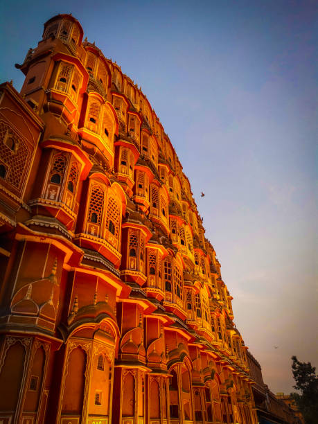 Hawa Mahal Jaipur One of the colourful windows of Hawa Mahal that are spread over five stories jaipur photos stock pictures, royalty-free photos & images