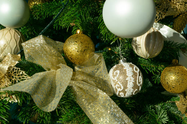 istock Decorated Christmas tree on blurred background with natural daylight 1204350438