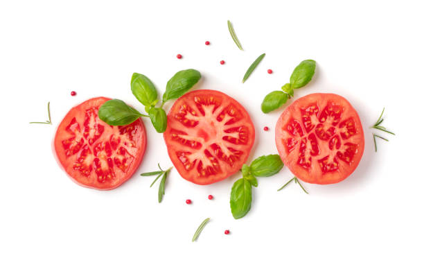 istock Sliced Tomatoes and Basil Top View and Flat Lay 1204350778