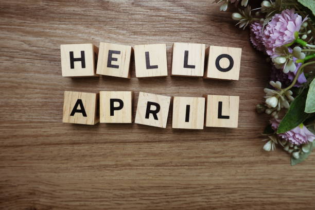 istock Hello April alphabet letters on wooden background 1204351477