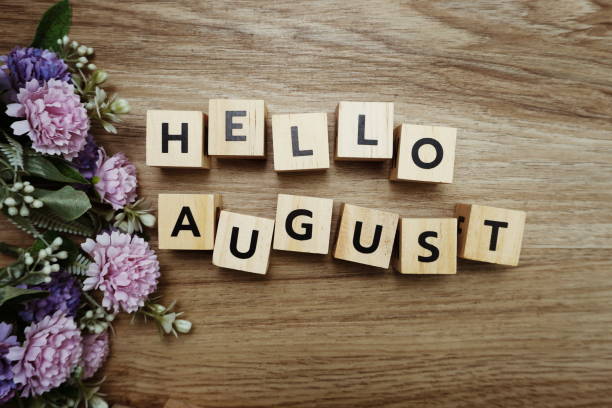 istock Hello August alphabet letters on wooden background 1204351485