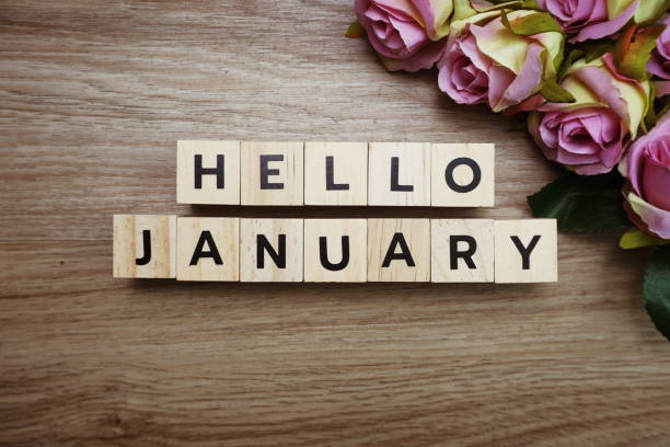 istock Hello January alphabet letters on wooden background 1204352560