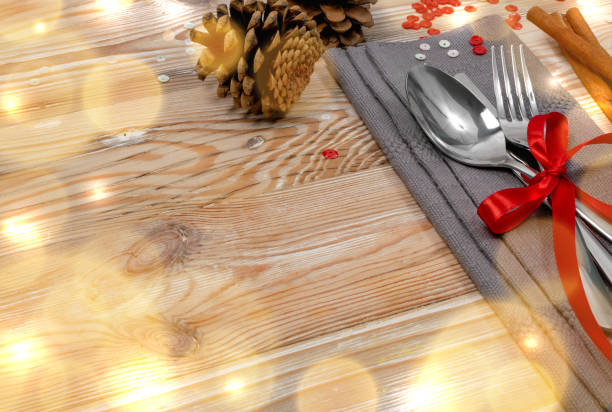 istock Christmas Dinner Table Setting with Cutlery and Winter Spices 1204354863