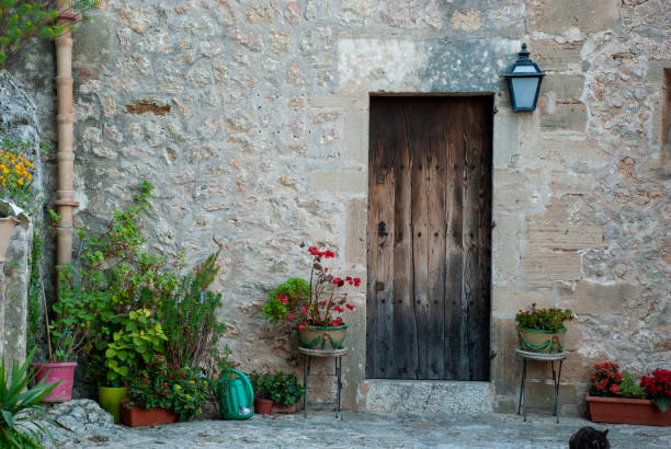 Old lamp, historical fassade, Biniaraix, Mallorca, Spain