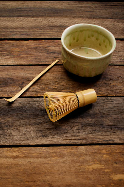istock Green tea accessories on wooden table Japanese style. 1204356309