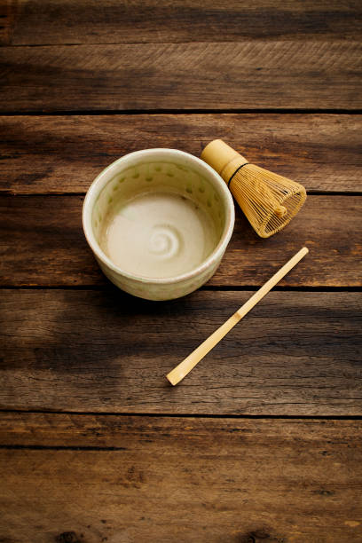 istock Green tea accessories on wooden table Japanese style. 1204356335