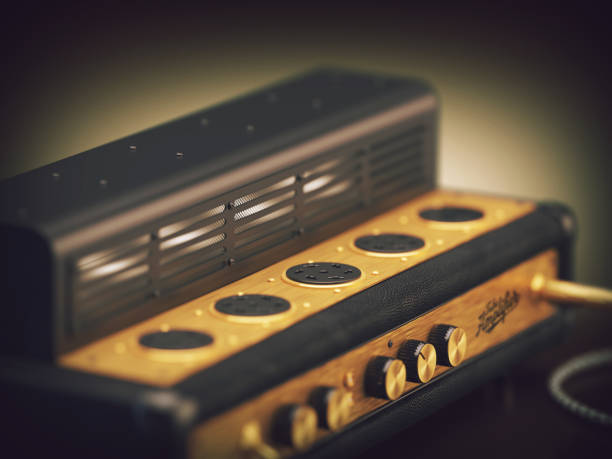 istock 3d rendering of an old-school tube amplifier with ambient dark background 1204363405