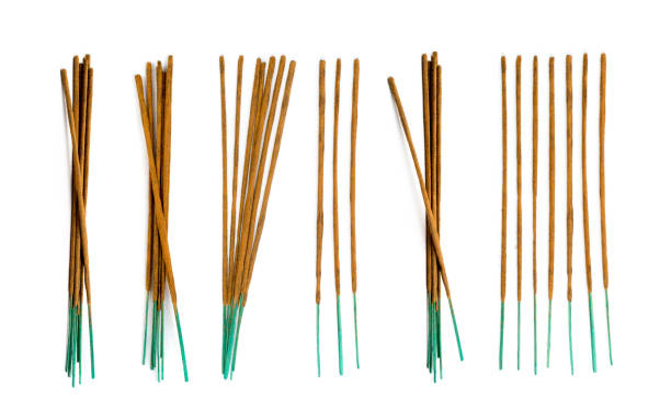 istock Brown indian incense aroma sticks isolated on white background 1204366585