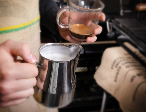 istock Making coffee in coffeeshop or cafe closeup 1204366598