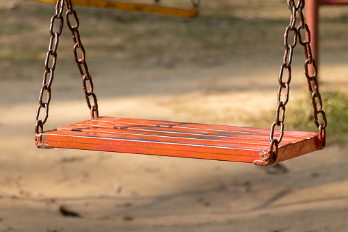 Swing close up on bury background, select focus