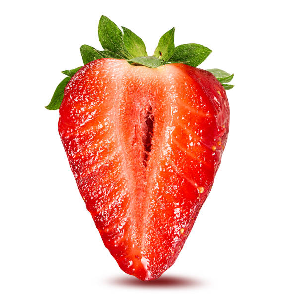 istock Strawberry halved isolated on white background with clipping path 1204370351