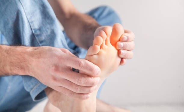 istock Man suffering from pain in foot. 1204371246