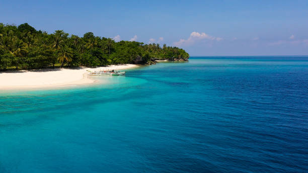 istock Tropical island with a white beach. Mahaba Island, Philippines 1204373357
