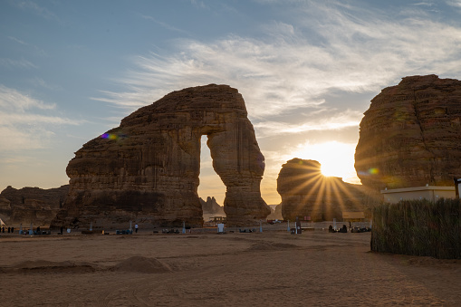 Al Ula, January 2, 2020. Tourists gather at Elephant Rock during sunset at the Winter at Tantora Festival in January 2020. Al-ʿUla is a governorate of the Medina Region, and a city in north-western Saudi Arabia.