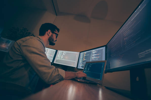 istock Low below angle view photo of system administrator pondering over how to renown access of majority of users to corporation web site requesting help of artificial intelligence 1204373404