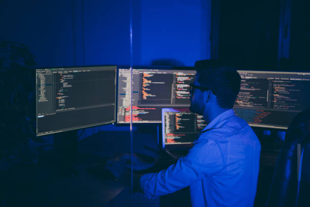 istock Profile side view of his he nice senior middle top specialist brunet guy providing service outsource tech solving problem debug report quality testing qa in dark blue room workplace station indoors 1204374444