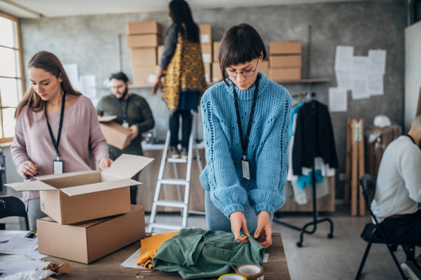 istock Diverse group of people arranging customers orders for drop shipping 1204375140