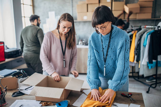 istock Diverse group of people arranging customers orders for drop shipping 1204375205