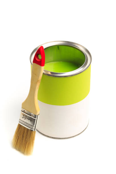 istock Can with green paint with brush  isolated on white background - Image 1204375312