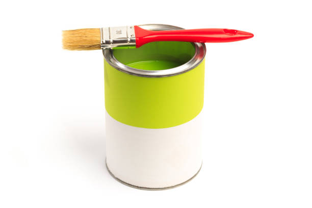 istock Can with green paint with brush  isolated on white background - Image 1204375613