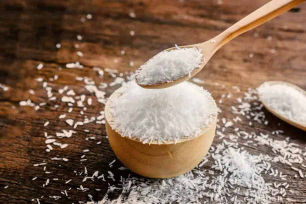 mono sodium glutamate (MSG) or seasoning ,gourmet powder on wooden table