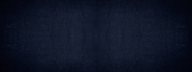 istock Dark blue grunge background. Painted texture of a plastered concrete wall. 1204379306