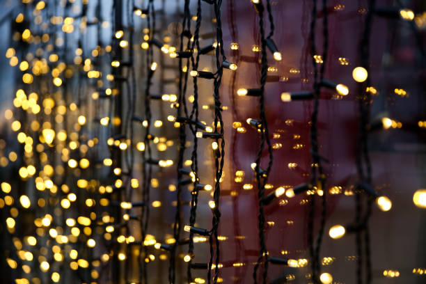 istock festive background with golden garland 1204379411