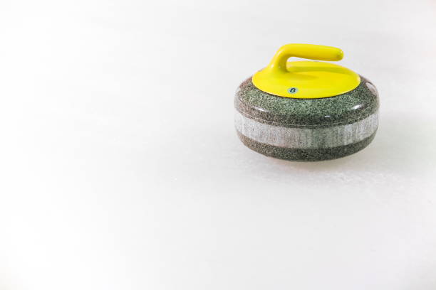 istock curling stone on ice near the home 1204379648