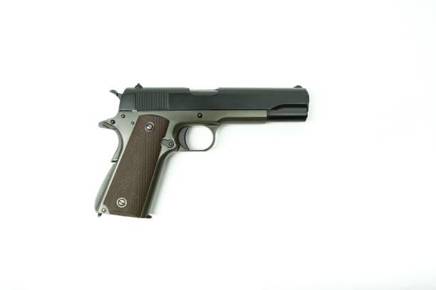 istock black hand gun close up 1204379707